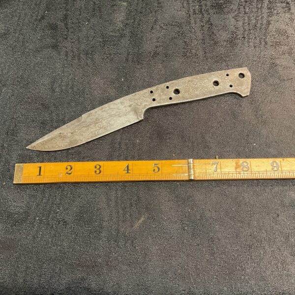 Unfinished Damascus steel knife blade blank for custom knife making.