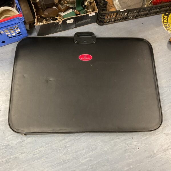Jumbo portapuzzle board for puzzle storage and travel.