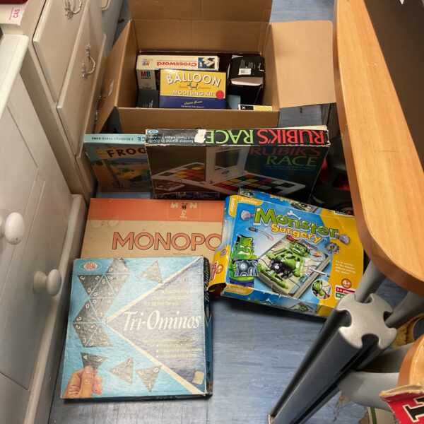 Vintage board games lot including Monopoly for collectors.