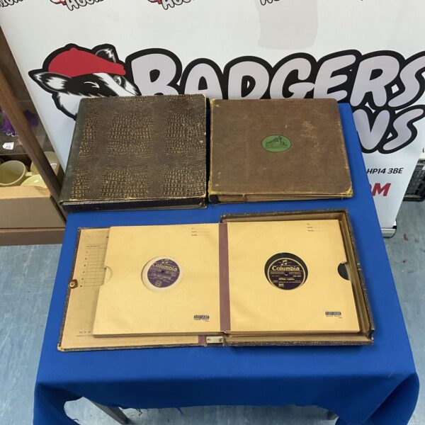 Three vintage gramophone record albums in a lot.