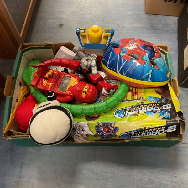 Lego Ninjago clock and remote control snake toy in a mixed lot.