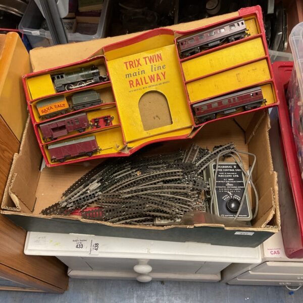 Vintage Trix Twin railway set with tracks and transformer.