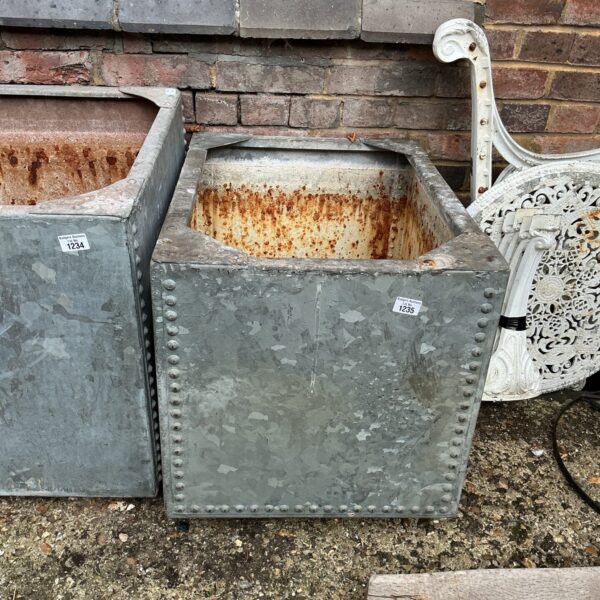 Vintage galvanised water tank for garden or livestock use.