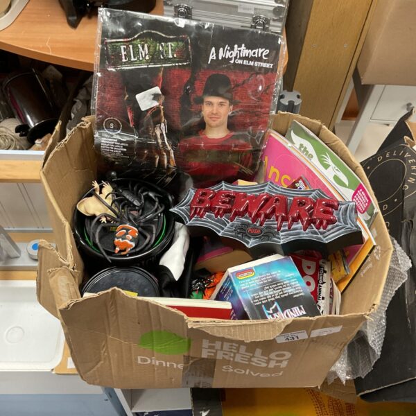 Mixed lot of Halloween decorations and spooky props for seasonal display.