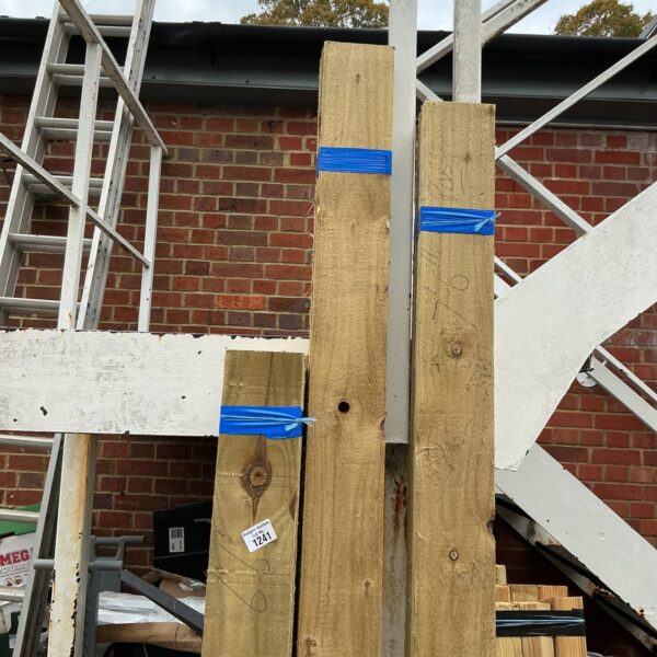 Three bundles of approximately 7ft timber secured with blue strapping.