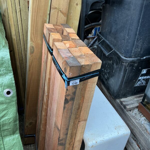 Stack of three bundles of 3’6” timber for construction projects.