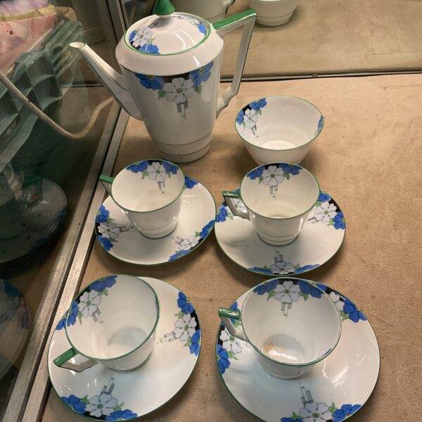 Vintage Art Deco coffee set by Bell China with floral details.