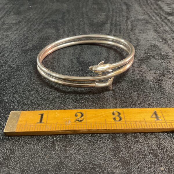 Sterling silver dolphin bracelet, detailed animal jewellery.