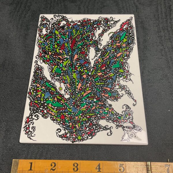 Vibrant handmade ceramic tile art signed mot 2003 abstract design.
