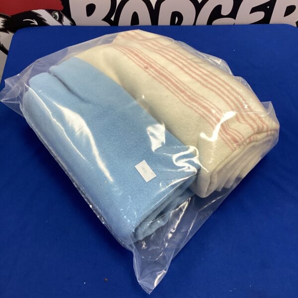 Pair of vintage wool blankets, neutral tones, textile collectibles.