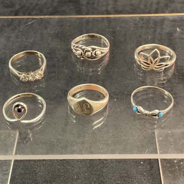 Mixed lot of six 925 sterling silver rings in various styles.