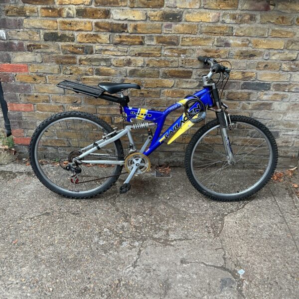 Full view of a vintage Saracen Ikon full suspension mountain bike.