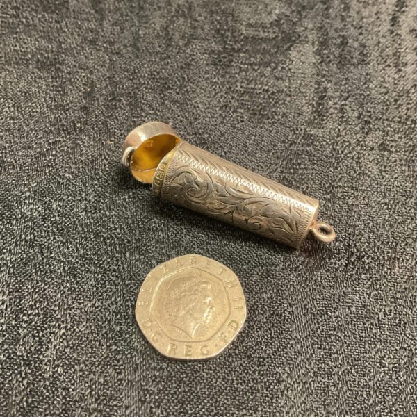 Intricately engraved antique silver cheroot holder case with fob chain loop.