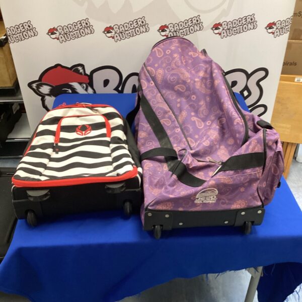 Purple Jeep sports bag with wheels and extendable handle.