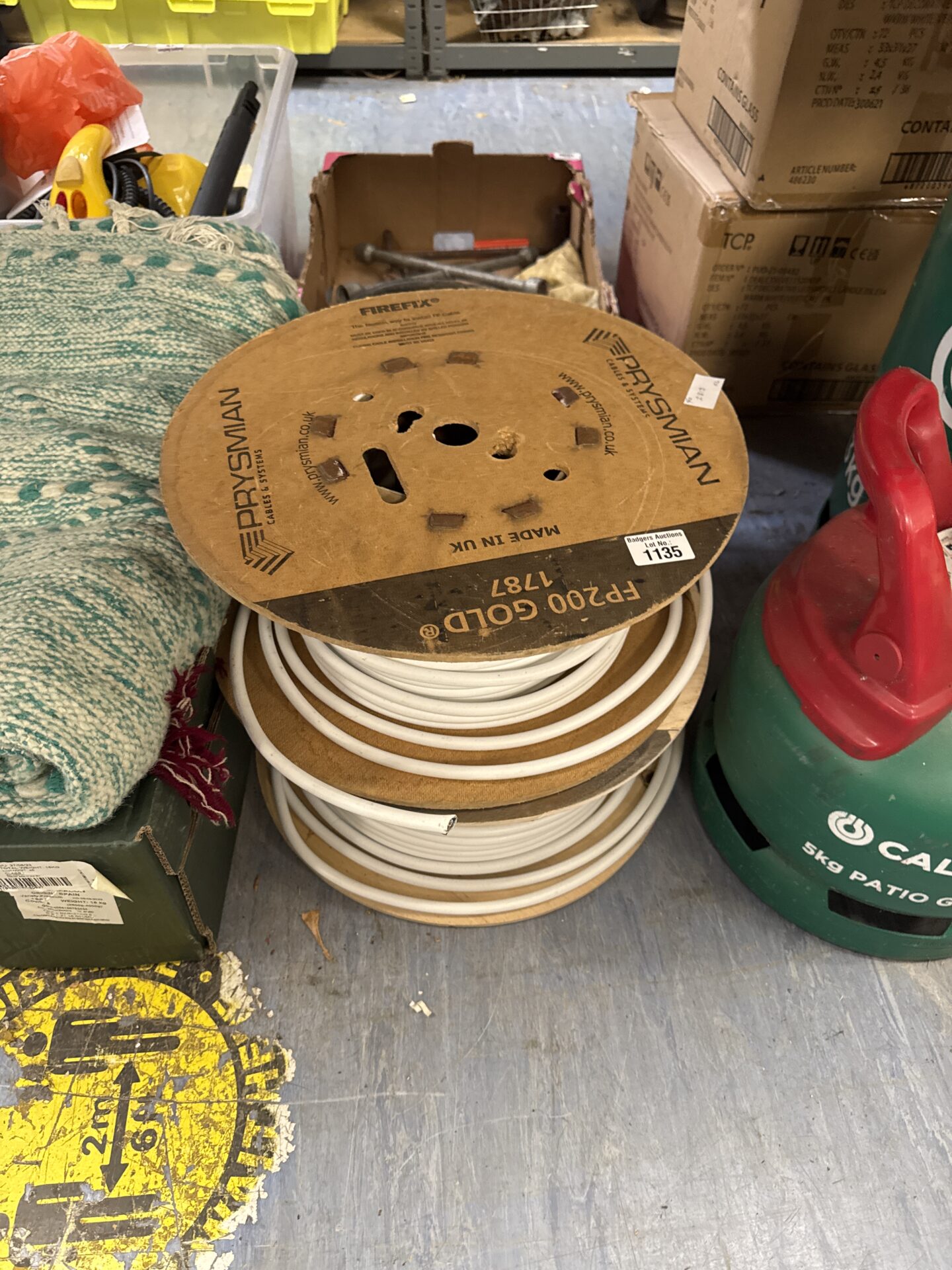 Two part used reels of firefix fp200 gold 1787 cable