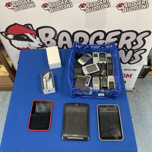 Mixed lot of used mobile phones and tablets for repair or parts.