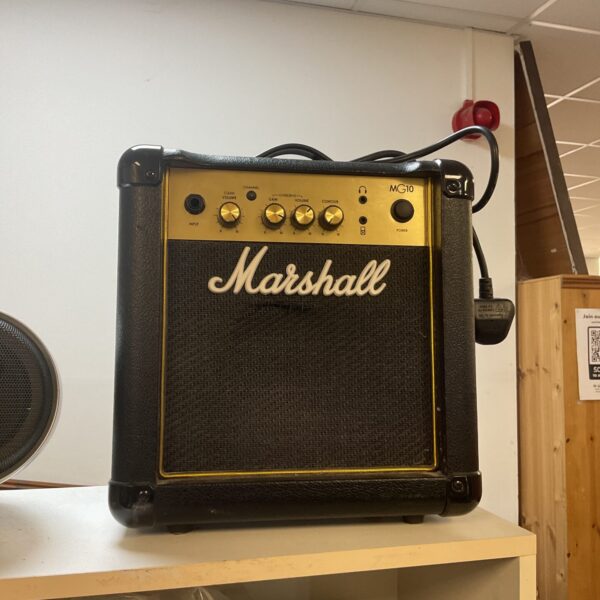 Black Marshall MG10CF guitar amplifier, front view.