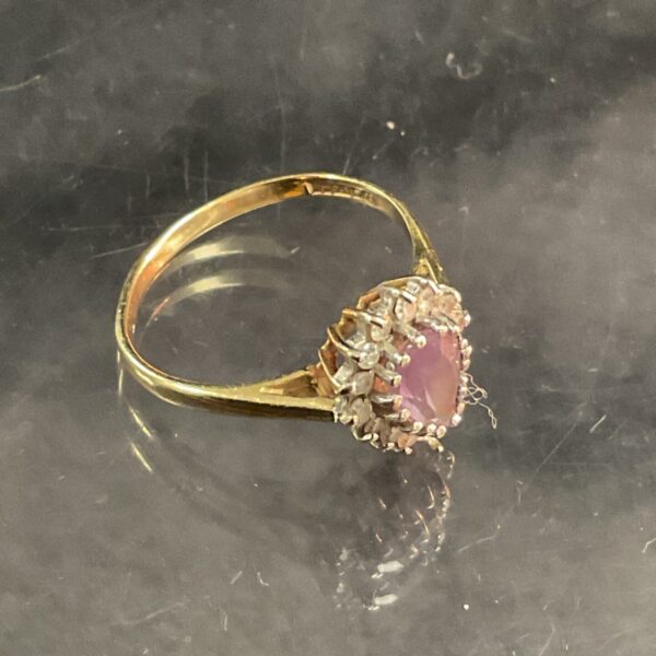 Vintage 9ct gold ring with heart-shaped amethyst and diamonds.