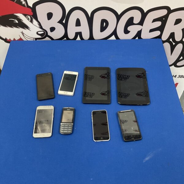 Mixed lot of used smartphones and tablets for collectors.