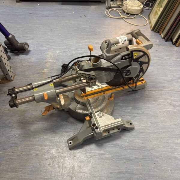 Titan chop saw for metal cutting, offered for spares or repair.