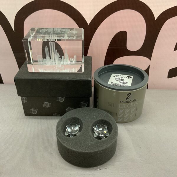 Swarovski crystal World Trade Center paperweight, a collectible sculpture.