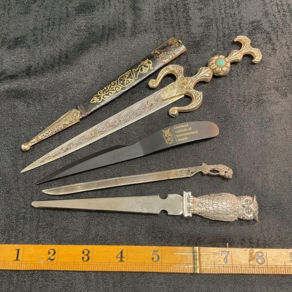 Four Paper knives letter openers