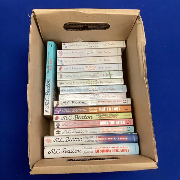 Vintage Agatha Raisin book set by M.C. Beaton, a collection of mystery novels.