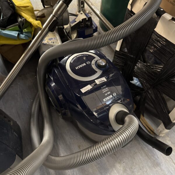 Vintage Bosch GS-40 Stowaway cylinder vacuum cleaner in used condition.