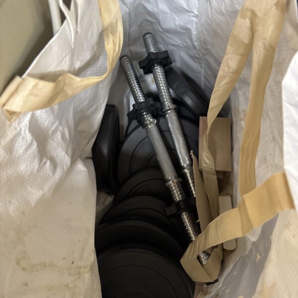Vinyl dumbbell set with weights for home fitness.