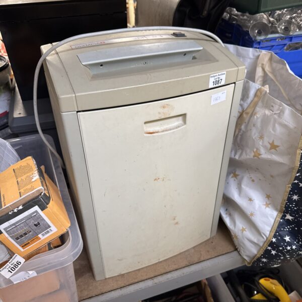 Used Olympia office paper shredder for secure document disposal.