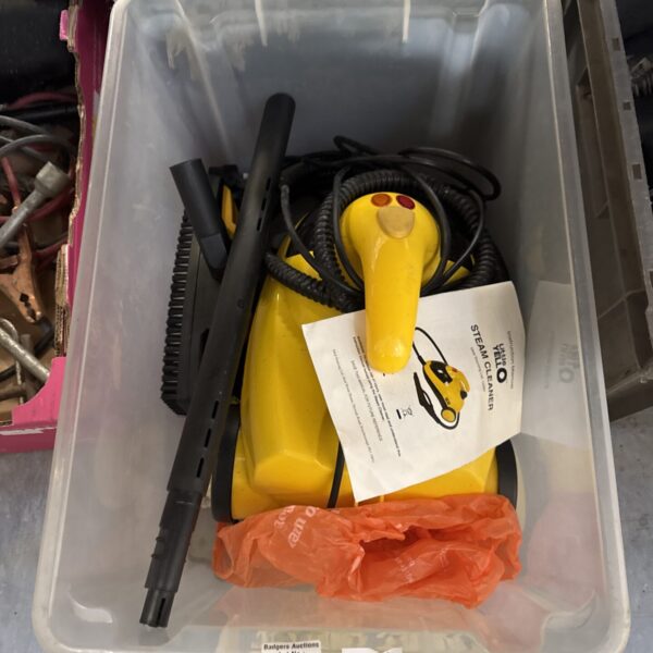 Yellow handheld steam cleaner for home cleaning tasks.