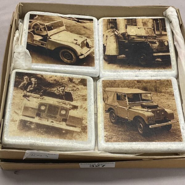 Vintage Land Rover coaster set featuring a classic vehicle.