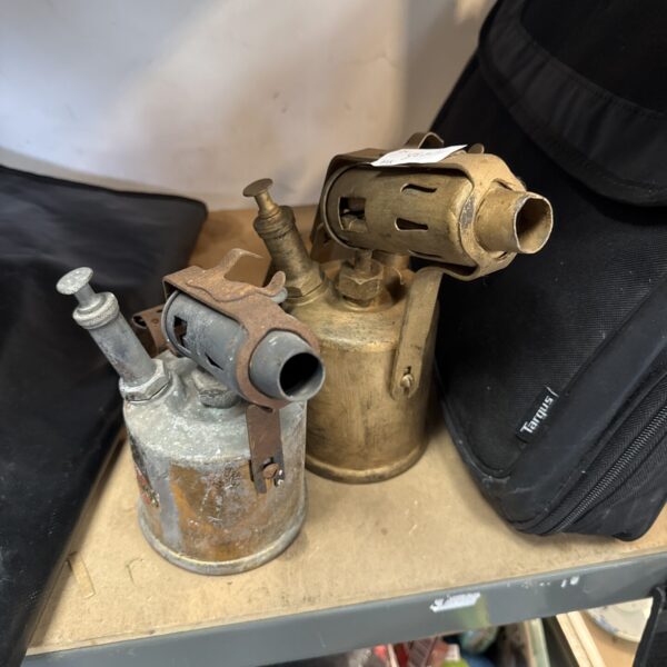 Vintage blowtorch pair, antique brass gas torch collectible.