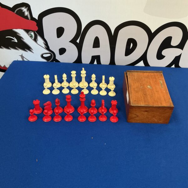 Vintage wooden chess set with box, classic chessmen.