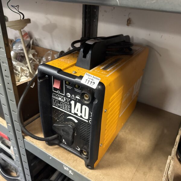 Vintage Impax IM-Arc 140 portable welder for metalworking projects.
