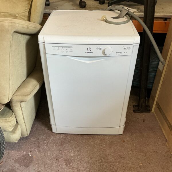 White Indesit dishwasher in a home kitchen setting.