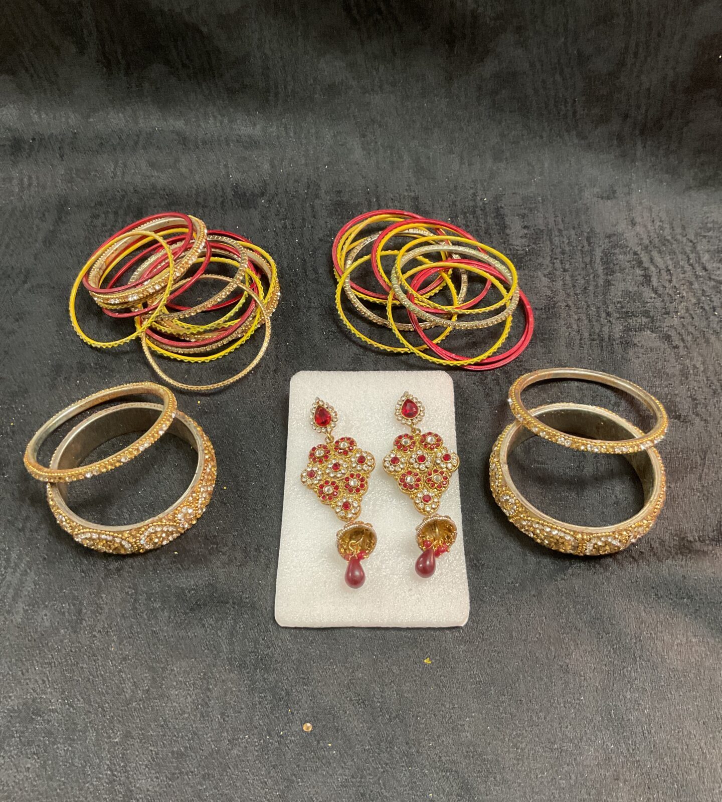 Colourful Indian bangles and earrings set, traditional ethnic jewellery.