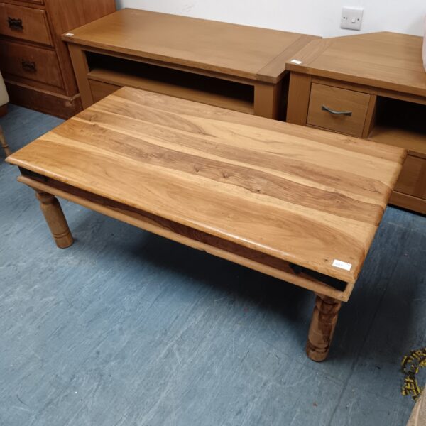 Carved Indian oak coffee table with rustic farmhouse style.