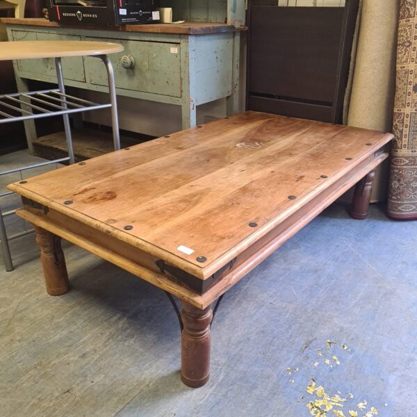 Rustic Indian oak coffee table with turned legs.
