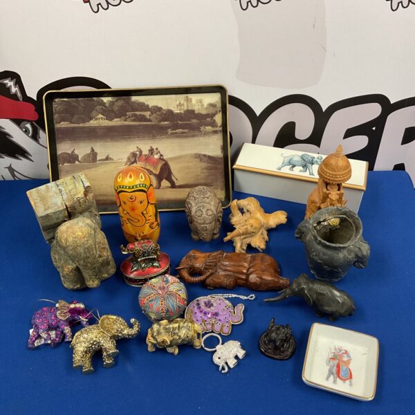 Overview of a lot of vintage Indian carved stone elephants.