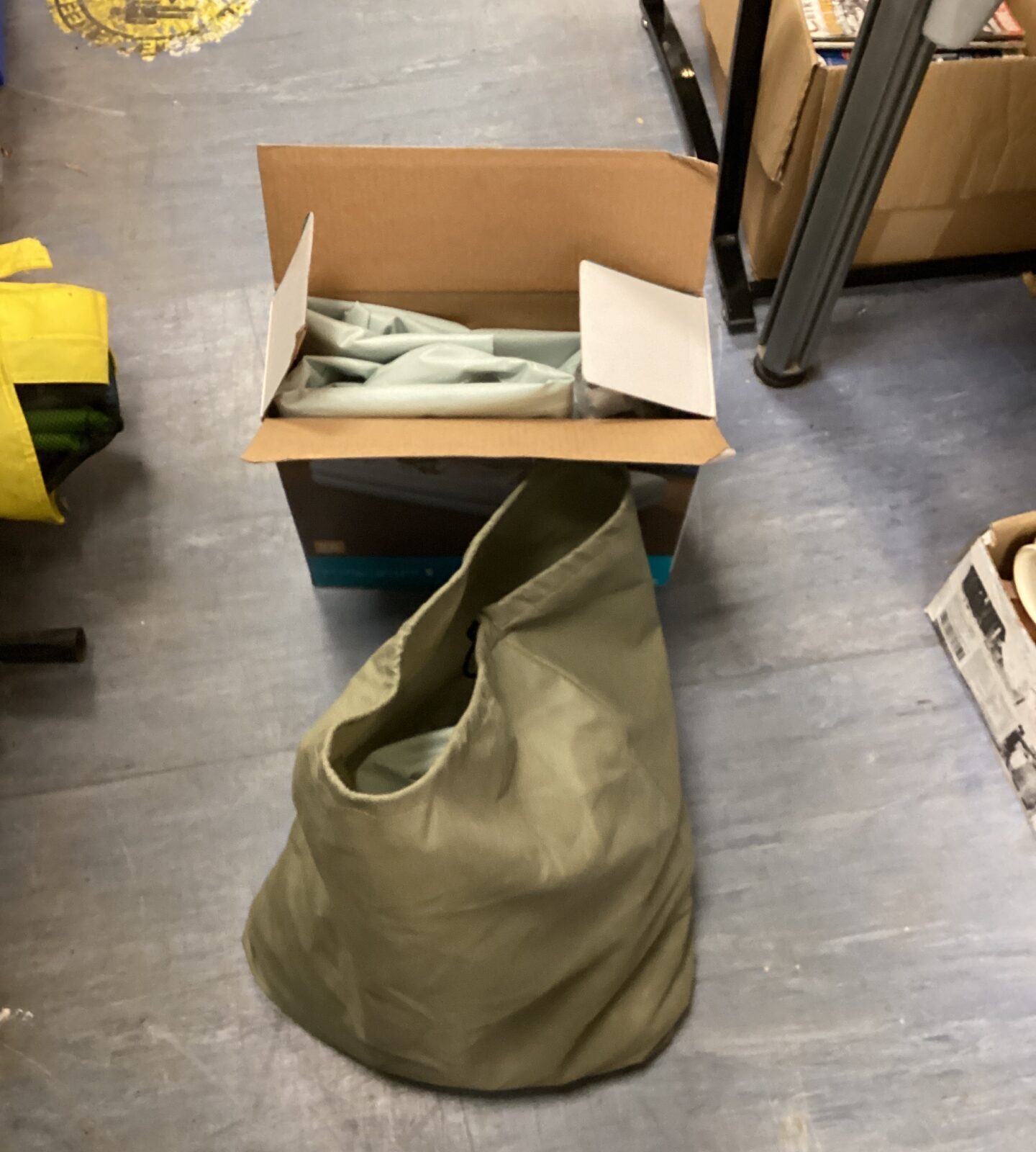 Dark green Intex inflatable mattress carry bag with drawstring closure.