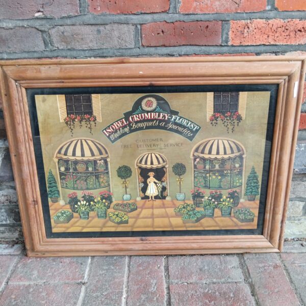 Vintage Isobel Crumbley florist print with floral arrangements.