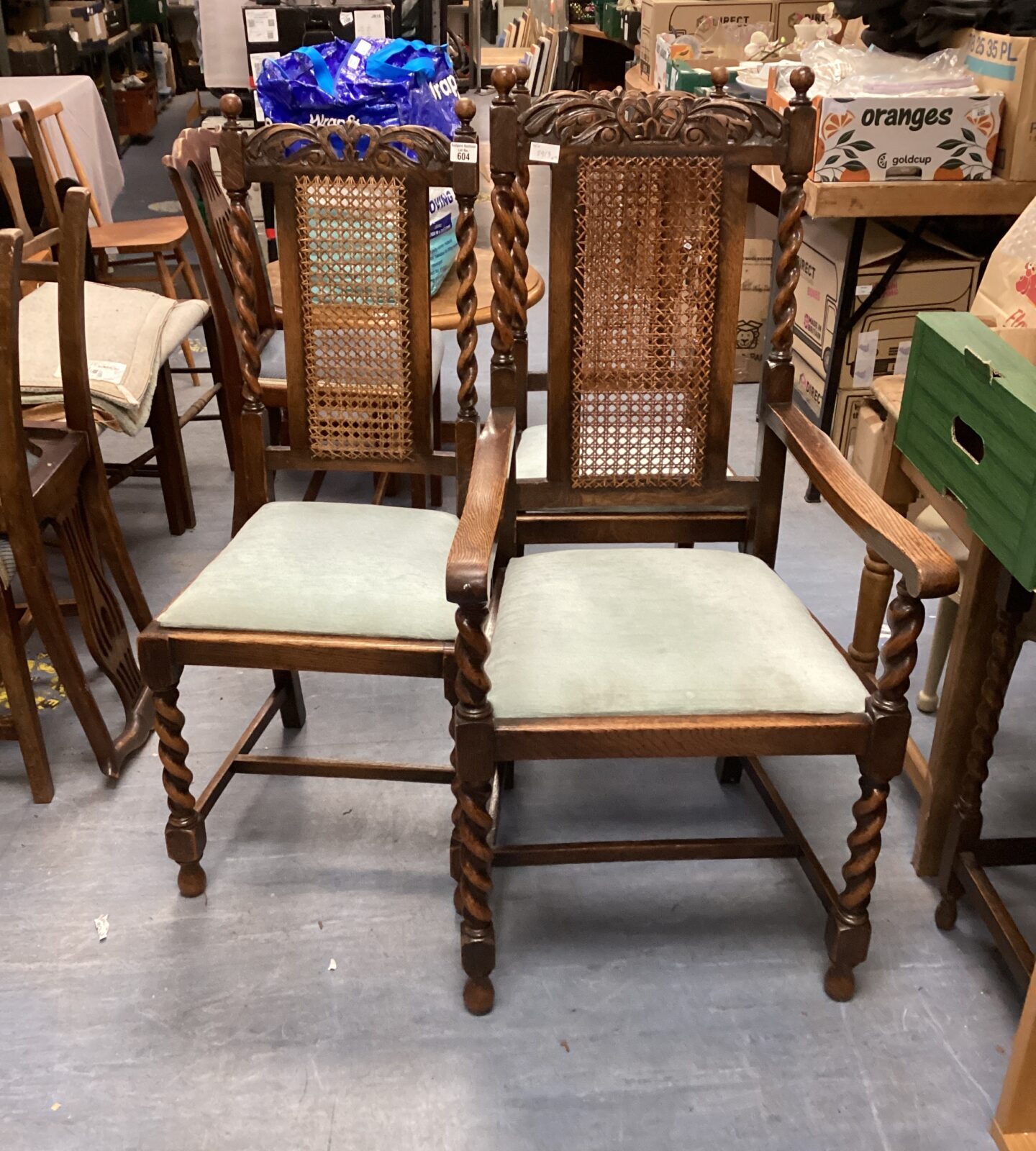 Antique Jacobean dining chairs with barley twist legs.