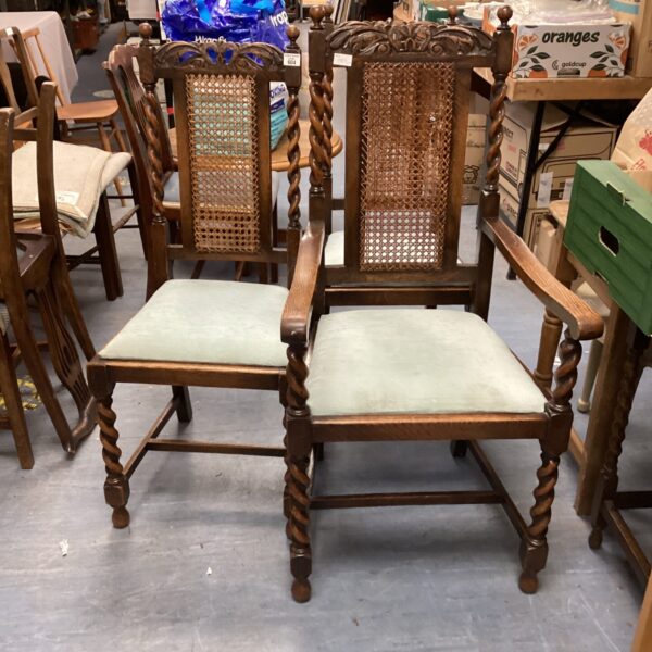 Antique Jacobean dining chairs with barley twist legs.