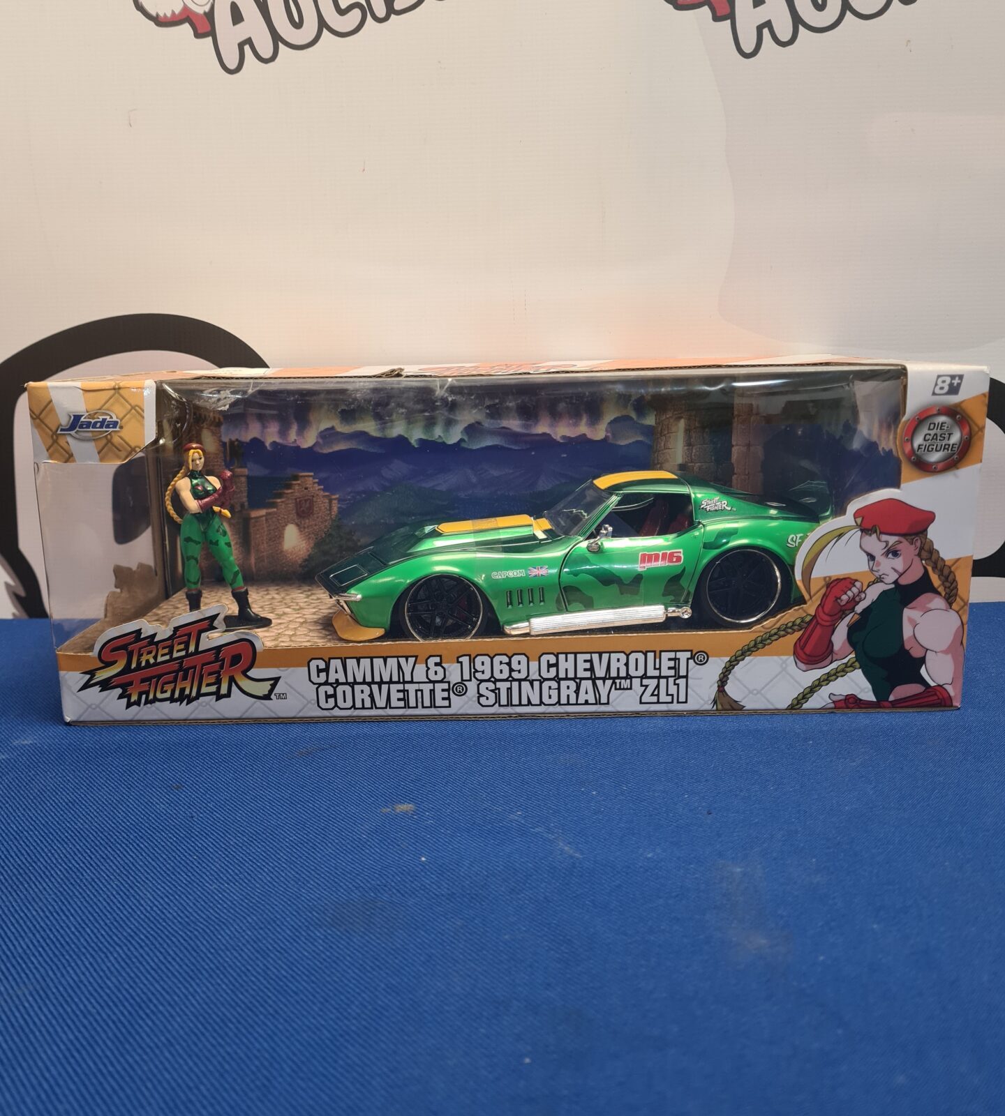Jada Street Fighter Cammy and 1969 Chevrolet Corvette ZL1 diecast model car.