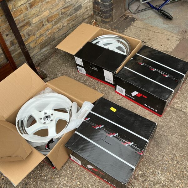 Boxed set of Japan Racing JR15 white alloy wheels.