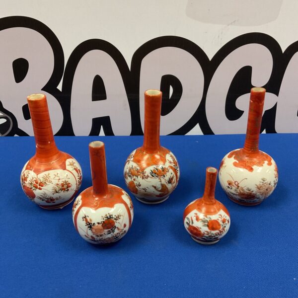 Group of five miniature Japanese Kutani vases with floral designs.