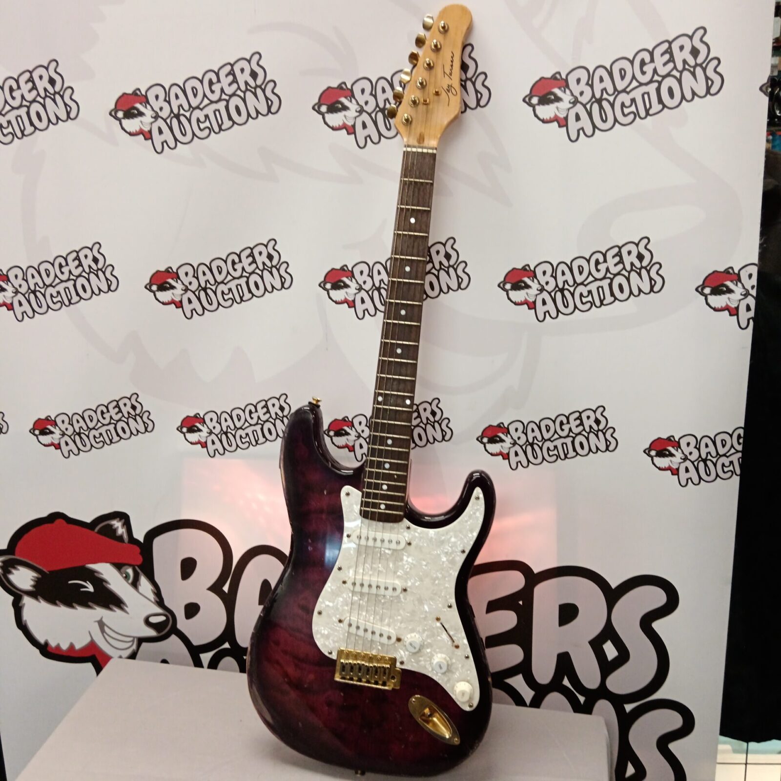 Vintage Jay Tunser electric guitar with a striking red finish.
