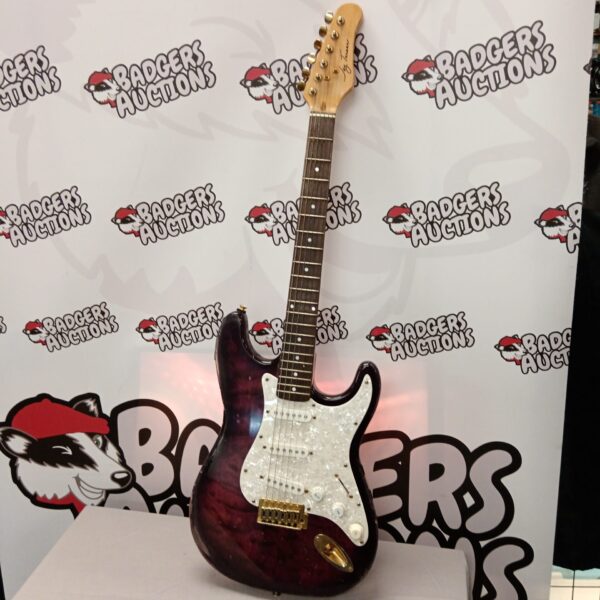 Vintage Jay Tunser electric guitar with a striking red finish.