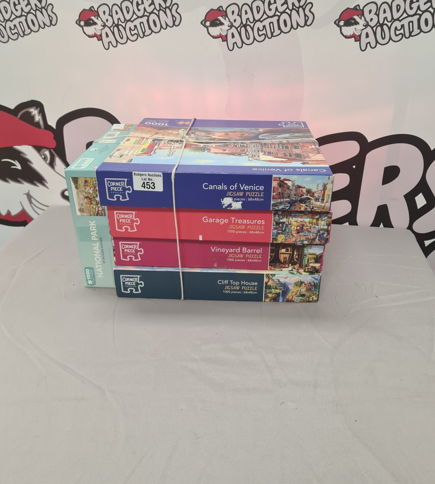 Vintage jigsaw puzzle lot with corner pieces for collectors.